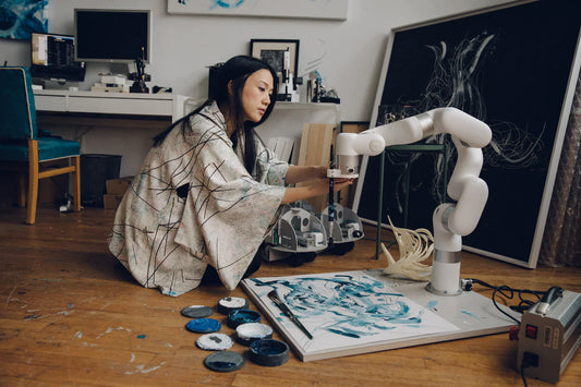 Artist Sougwen Chung works in her Brooklyn studio. (Celeste Sloman for The Washington Post)