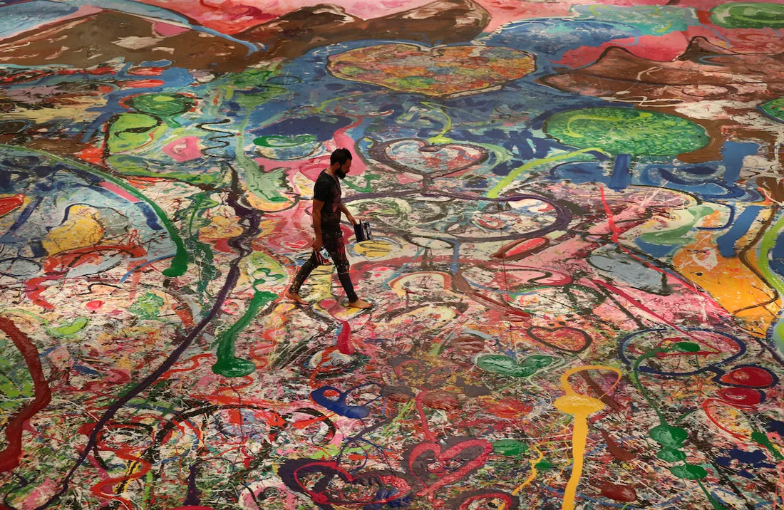 Sacha Jafri working on the world's largest painting at 17,000 square feet, Pyong Sumaria, 2020 via Art News; Sold for $62 million in 2021