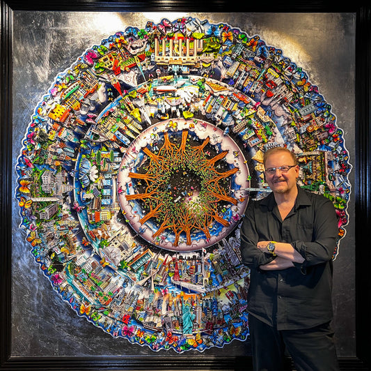Charles Fazzino pictured with his work