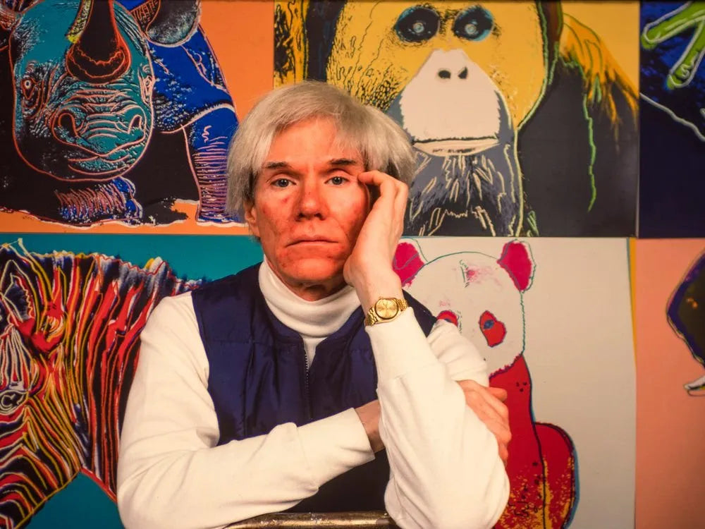 Andy Warhol posing in his studio, The Factory