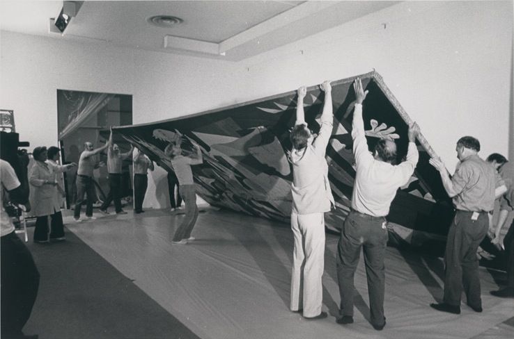 MoMA staff dismantling Pablo Picasso’s Guernica (1937) prior to its shipment to Spain, 1981 via MoMA.