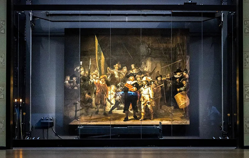 Rembrandt's 'Night Watch' is put in place at the Rijksmuseum during 'Operation Night Watch.' Remko de Waal/ANP/AFP via Getty Images