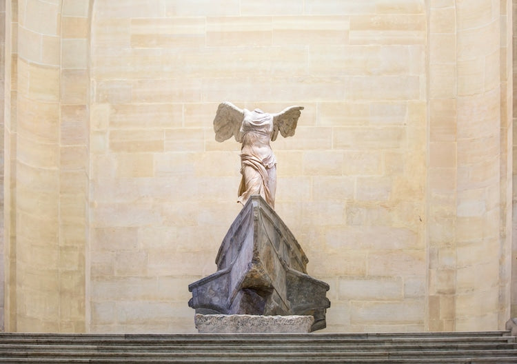 Unknown, Winged Victory of Samothrace, c. 190 BCE, marble, Louvre. Photo: muratart via Shutterstock via My Modern Met